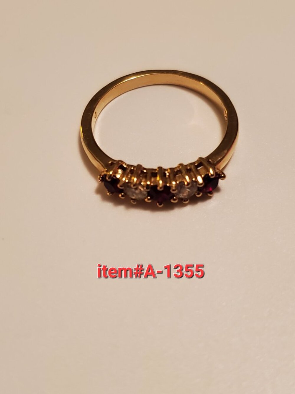 1 Gold Ring with Red & White gem stones, item # A- 1355, wt. 2 grams. size 8.